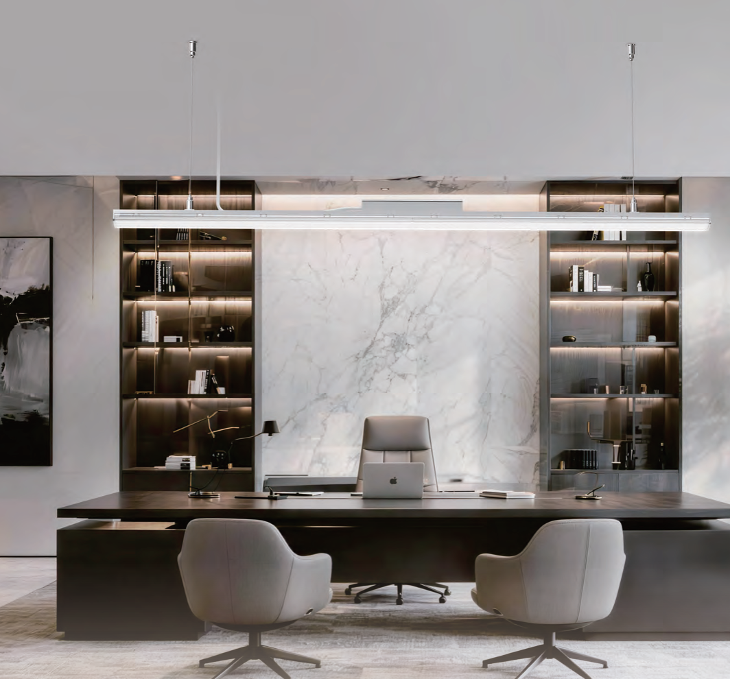 Glory Series suspended LED linear lights installed above an executive office desk